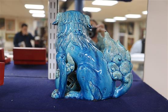 A pair of turquoise ground Buddhistic lions